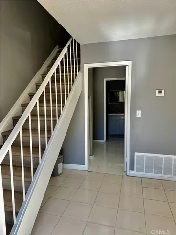 a view of an entryway with staircase