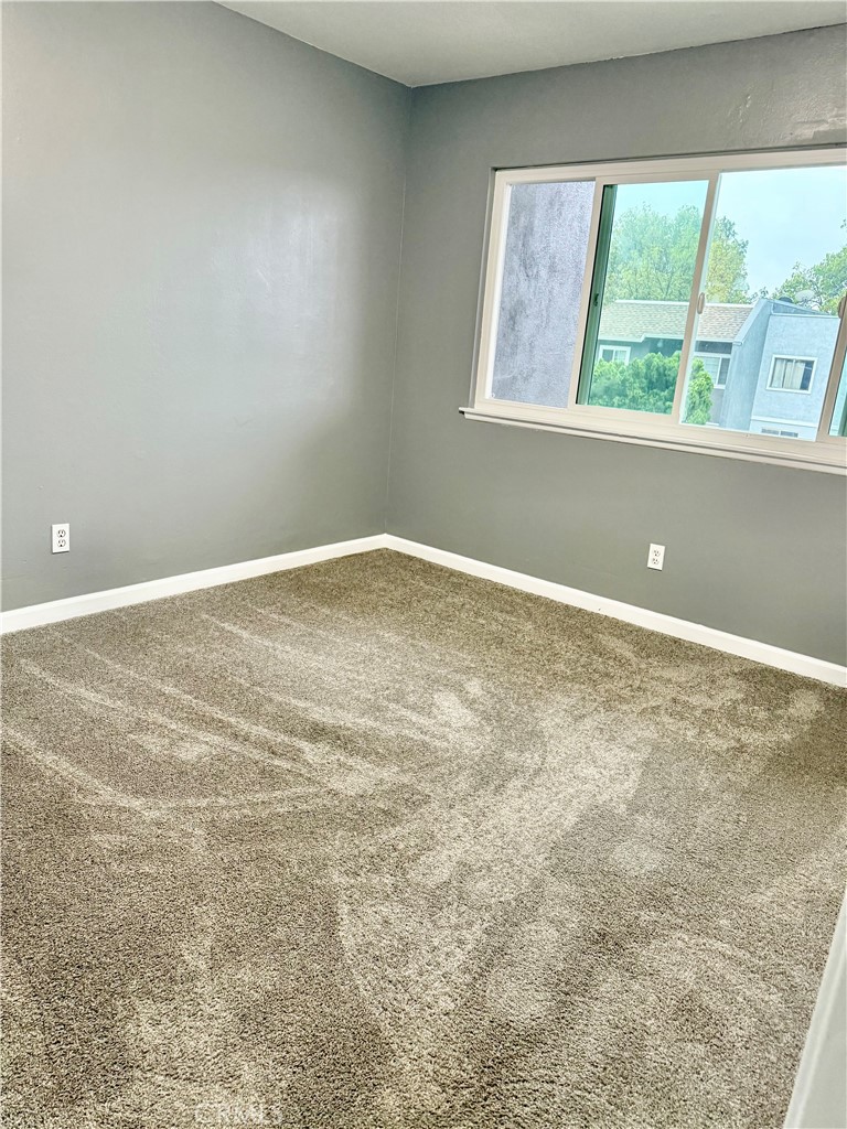 470 West Jackson Street Rialto, CA 92376 - Photo 18 of 28 a view of an empty room with a window