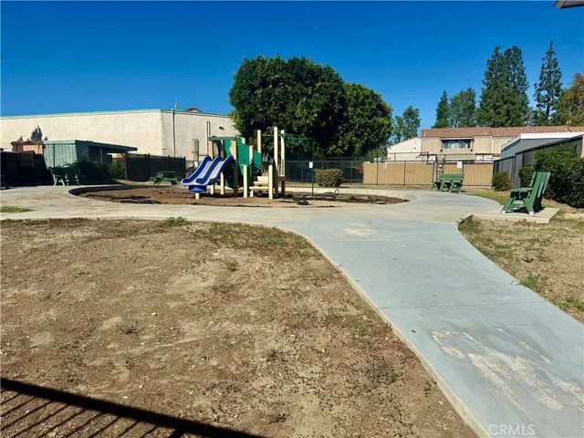 a view of a park with swings