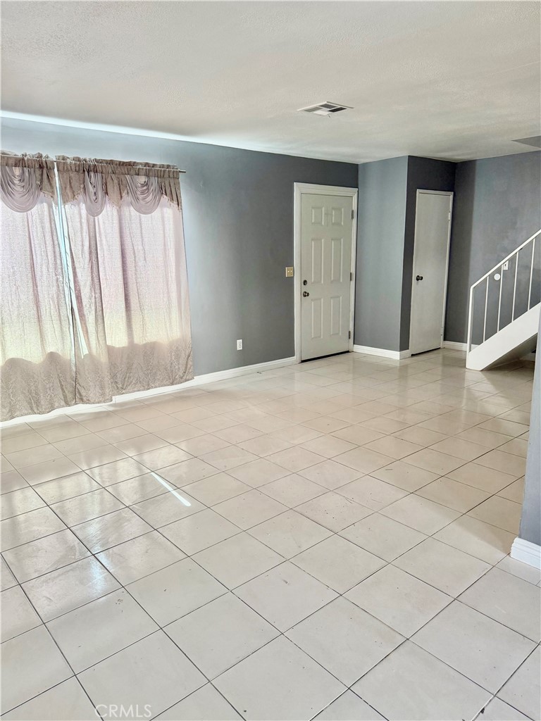 470 West Jackson Street Rialto, CA 92376 - Photo 5 of 28 a view of an empty room with a window