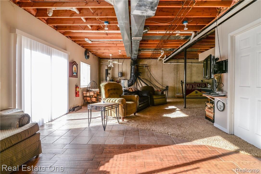 5172 Gregory Road Gregory, MI 48137 - Photo 20 of 37 Finished W/O basement just needs your final touches of a drop ceiling.