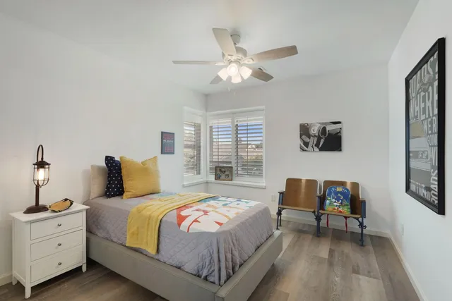 a view of wooden door and brick wall