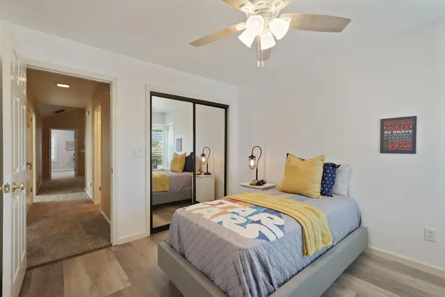 a view of an outdoor sitting area with furniture