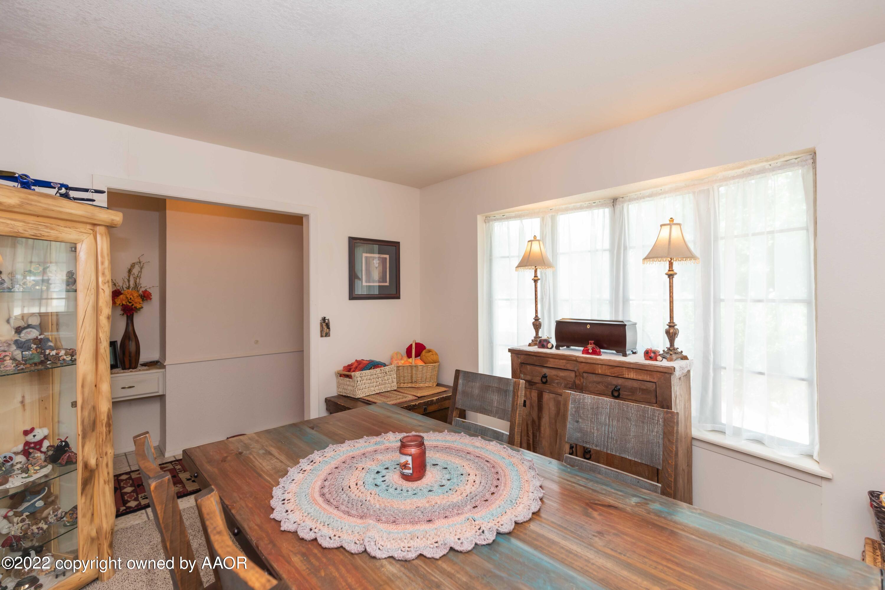 2816 Porter Drive Amarillo, TX 79110 - Photo 10 of 38 a table and chairs in a room
