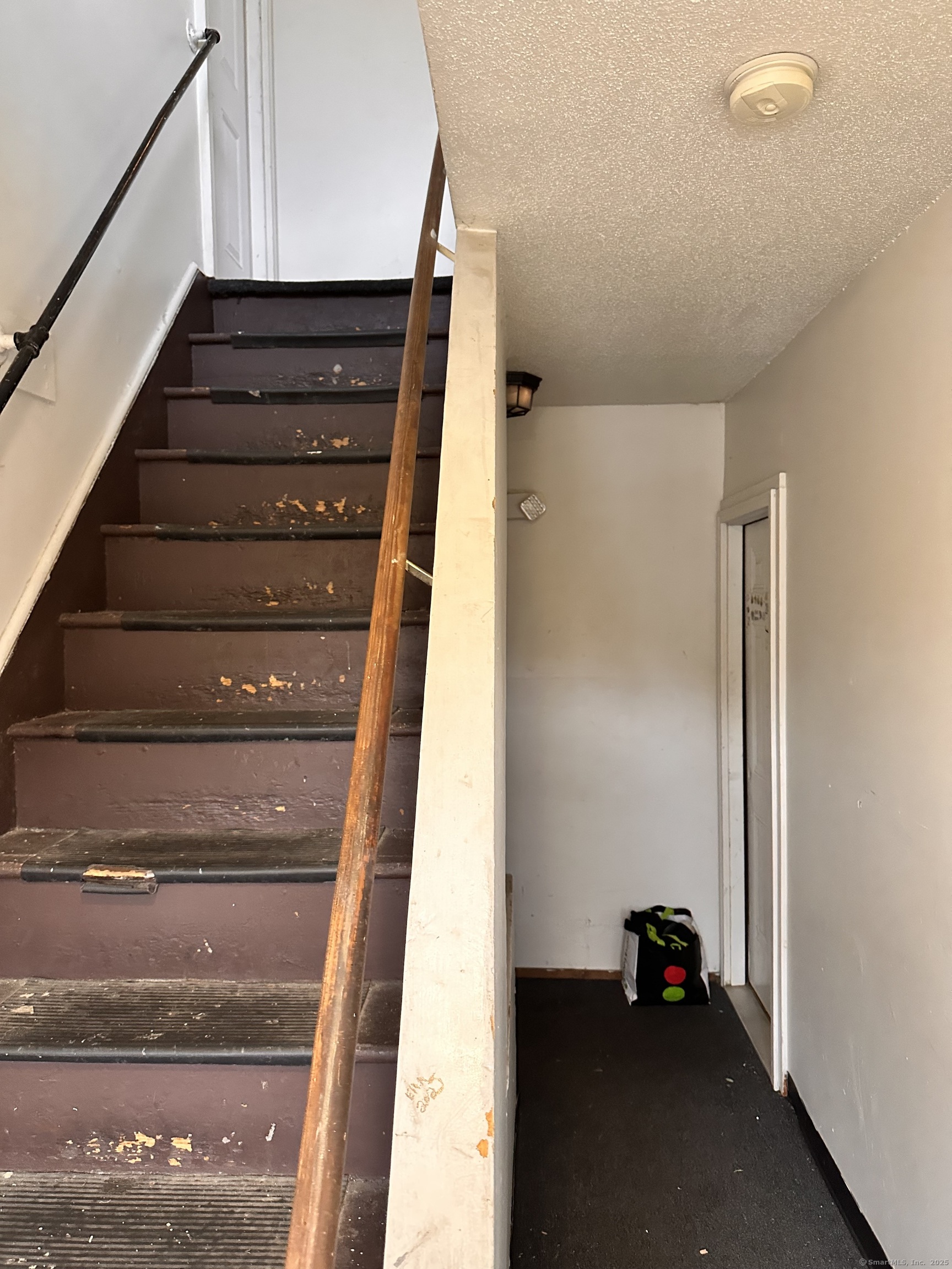 122 Willow Street Meriden, CT 06450 - Photo 12 of 13 a view of entryway with wooden floor