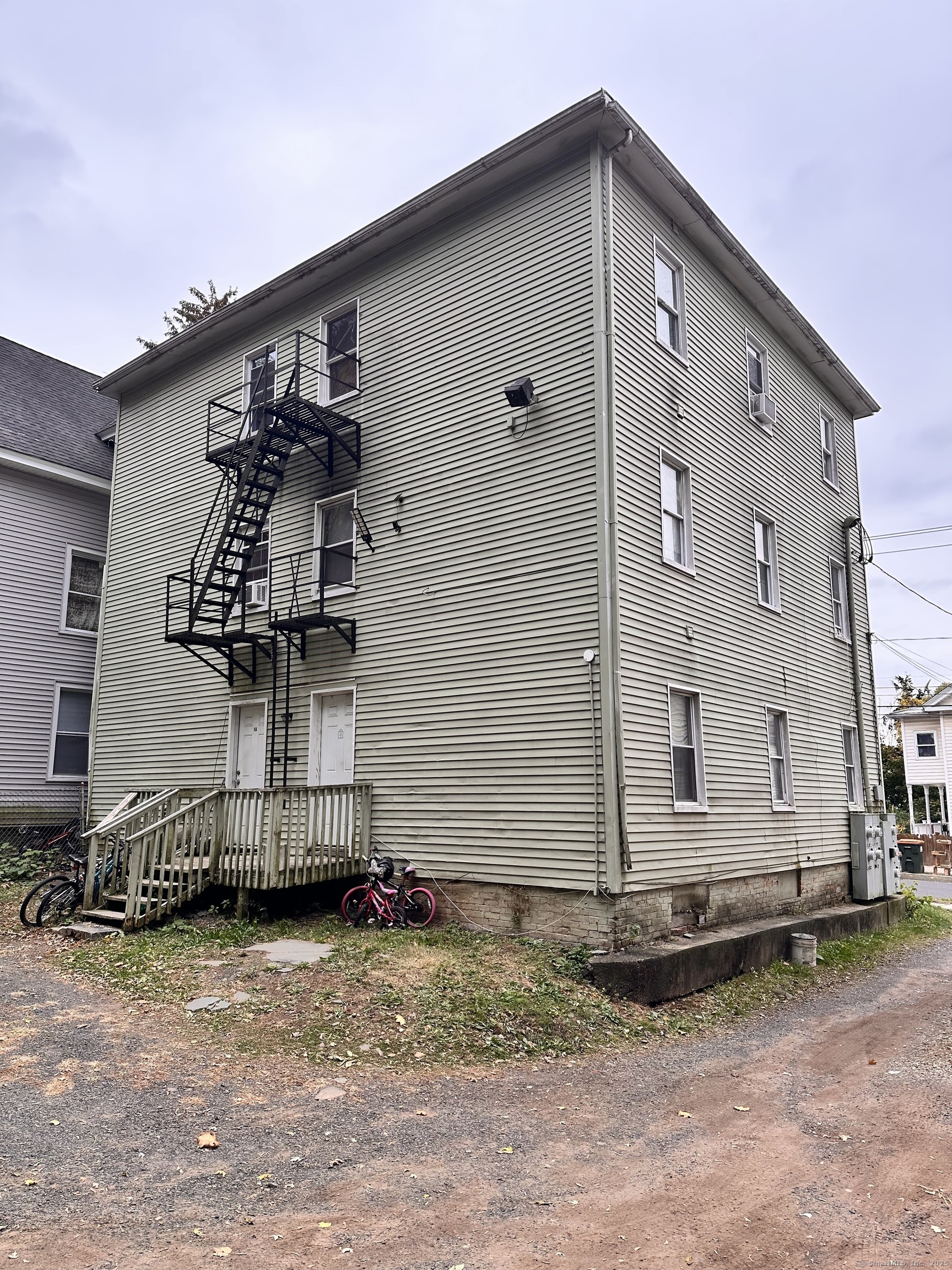 122 Willow Street Meriden, CT 06450 - Photo 3 of 13 a backyard of a house