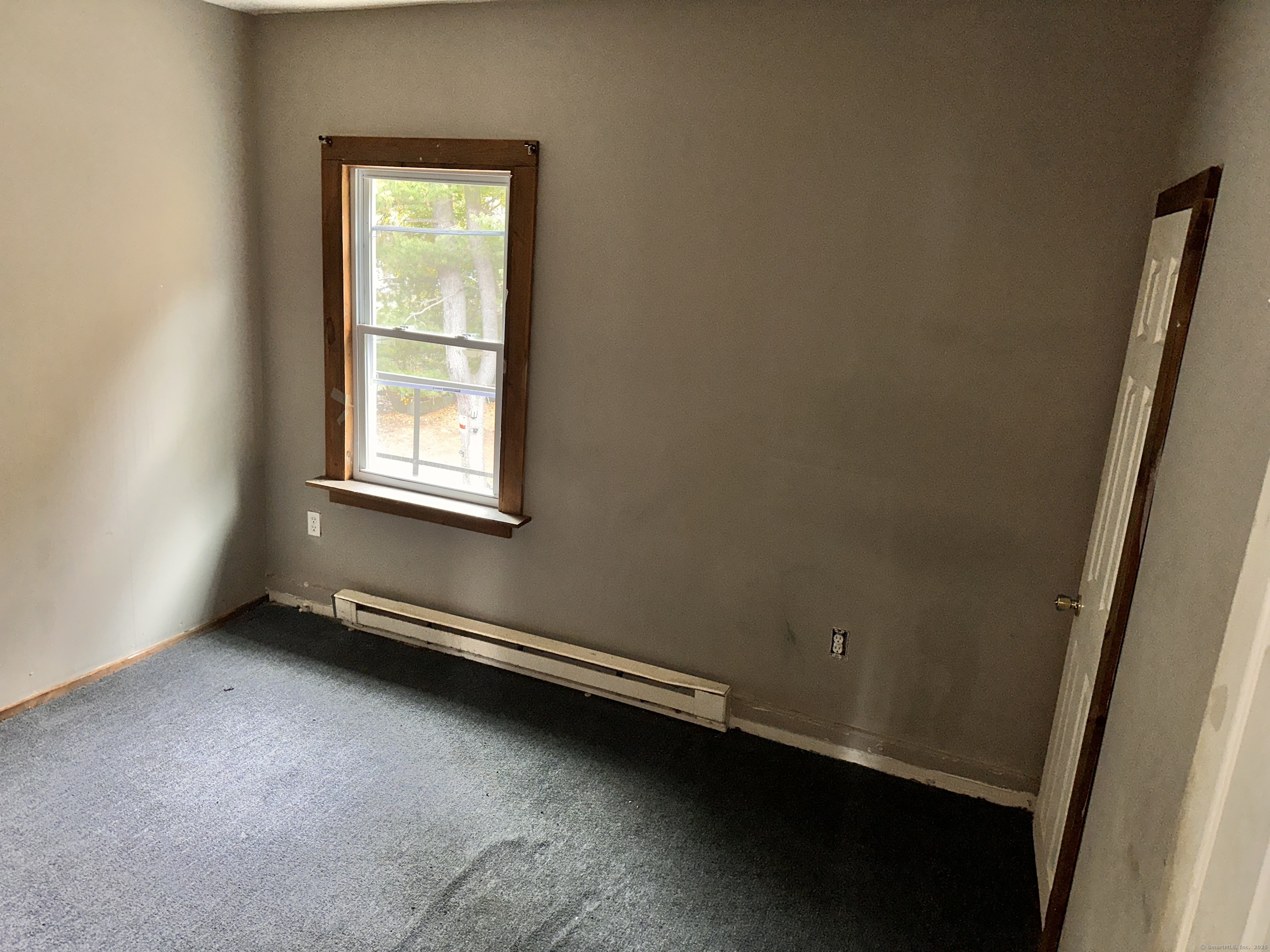 122 Willow Street Meriden, CT 06450 - Photo 7 of 13 an empty room with a window