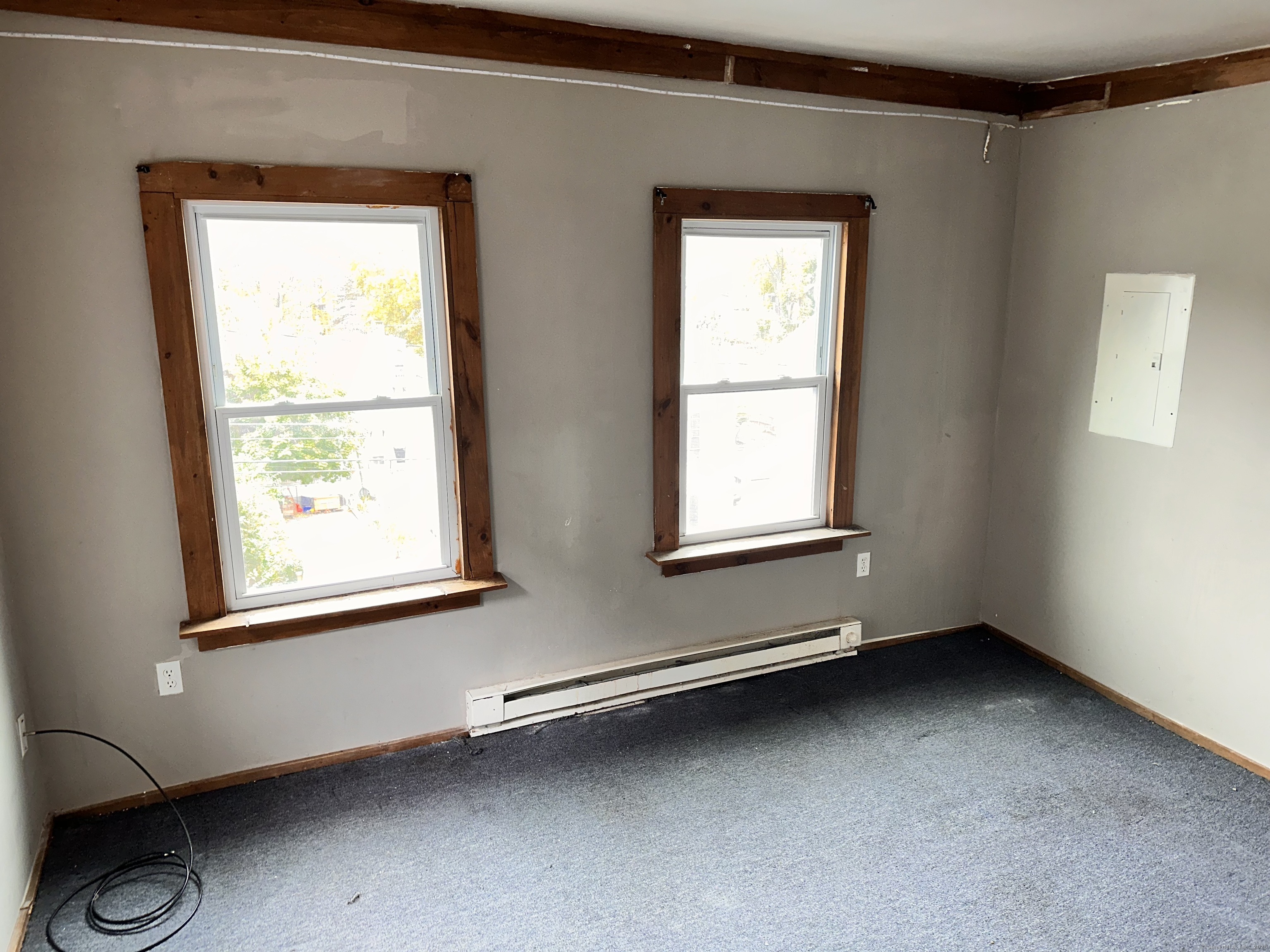 122 Willow Street Meriden, CT 06450 - Photo 9 of 13 a view of an empty room with a window