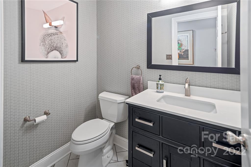 5428 Hillingdon Road Charlotte, NC 28226 - Photo 21 of 36 a bathroom with a sink and a toilet