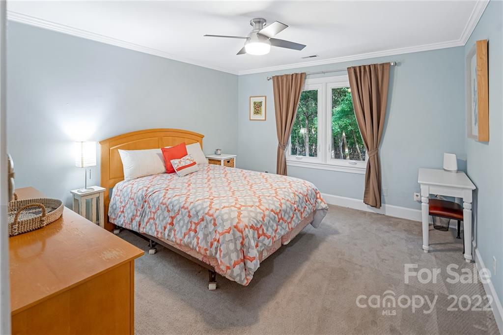 5428 Hillingdon Road Charlotte, NC 28226 - Photo 26 of 36 a bedroom with a bed and a window