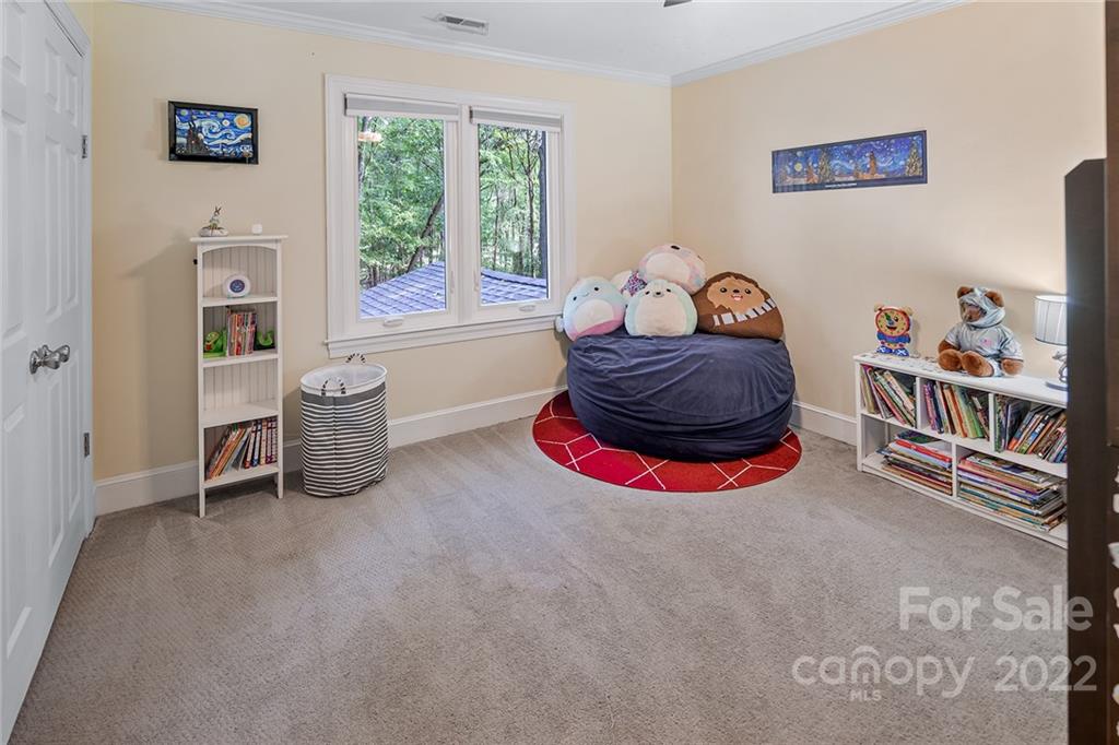 5428 Hillingdon Road Charlotte, NC 28226 - Photo 27 of 36 a room with furniture and a window