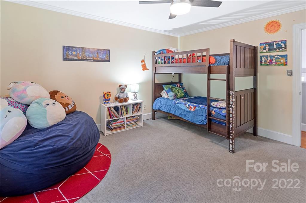 5428 Hillingdon Road Charlotte, NC 28226 - Photo 28 of 36 a bedroom with two beds and a desk