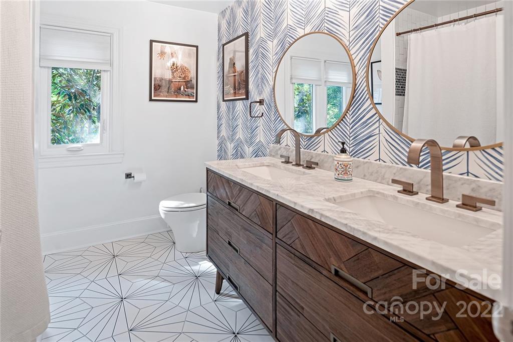 5428 Hillingdon Road Charlotte, NC 28226 - Photo 29 of 36 a bathroom with a double vanity sink mirror and toilet