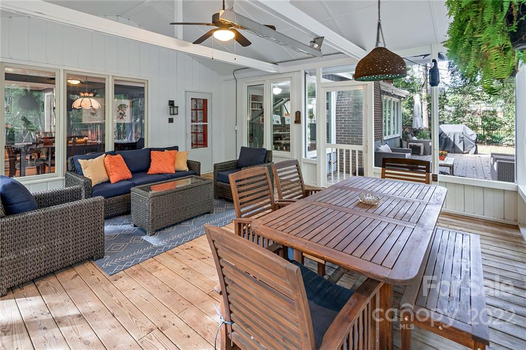 5428 Hillingdon Road Charlotte, NC 28226 - Photo 31 of 36 a outdoor space with patio the couches and a dining table with garden view