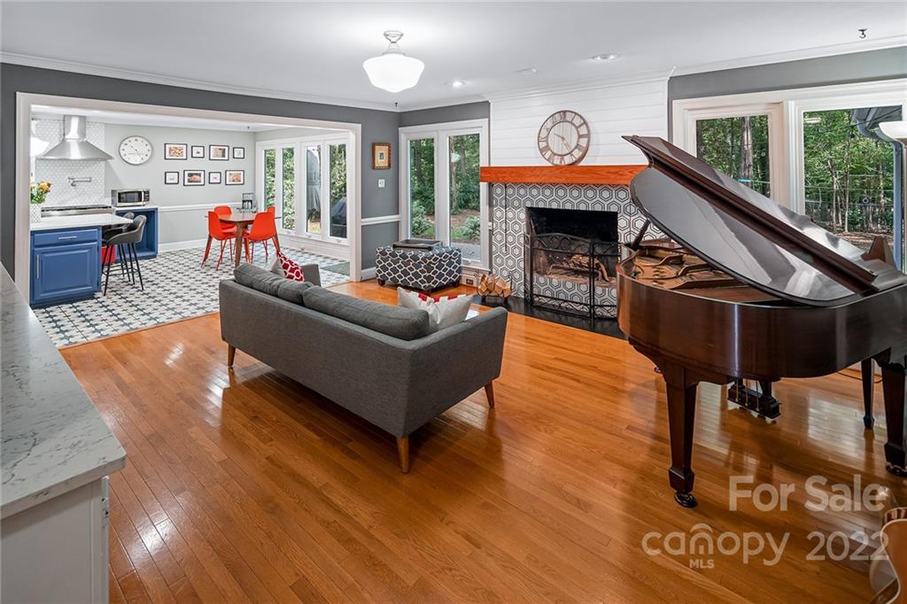 5428 Hillingdon Road Charlotte, NC 28226 - Photo 6 of 36 a living room with furniture and a fireplace