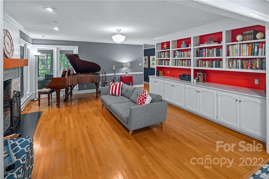 5428 Hillingdon Road Charlotte, NC 28226 - Photo 7 of 36 a living room with furniture and a wooden floor