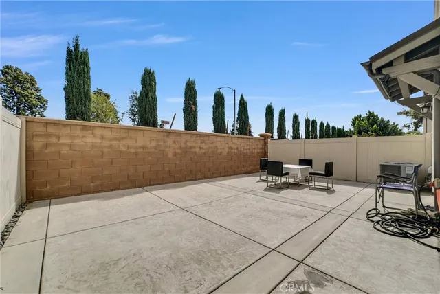 a view of swimming pool with chairs