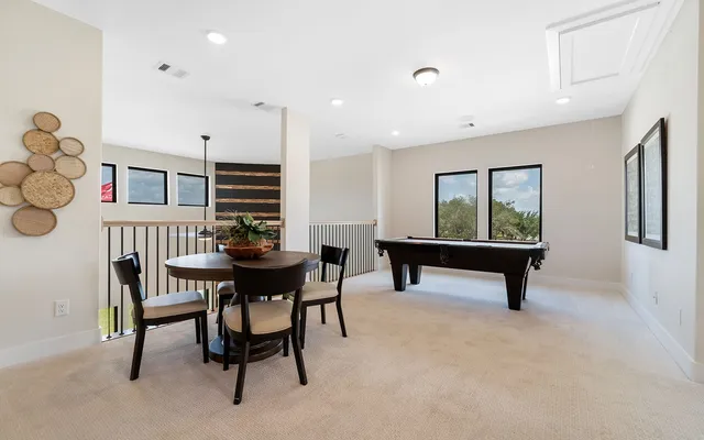 a view of a dining room with furniture
