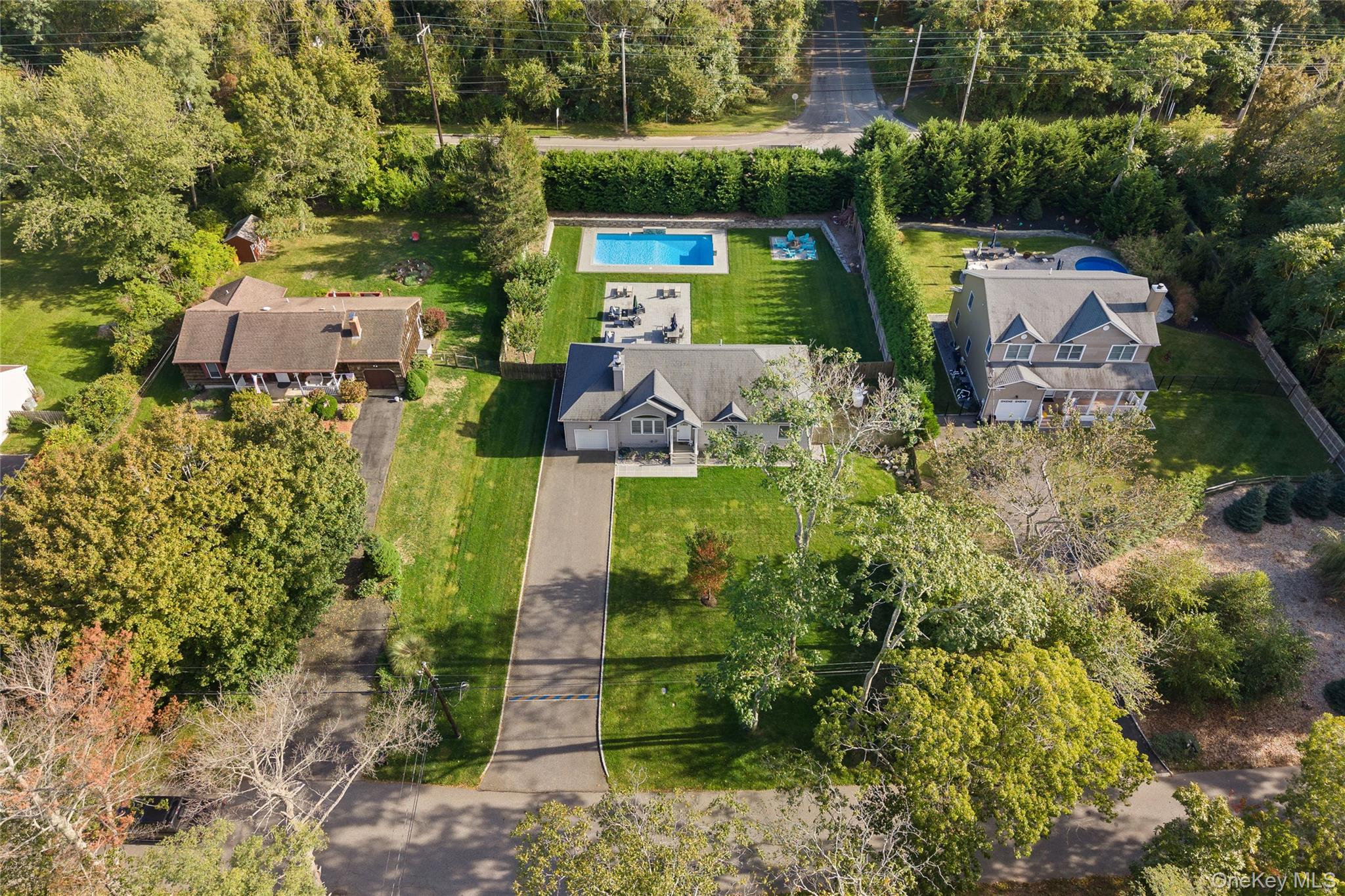 380 Homestead Way Greenport, NY 11944 - Photo 38 of 39 an aerial view of a house with a garden