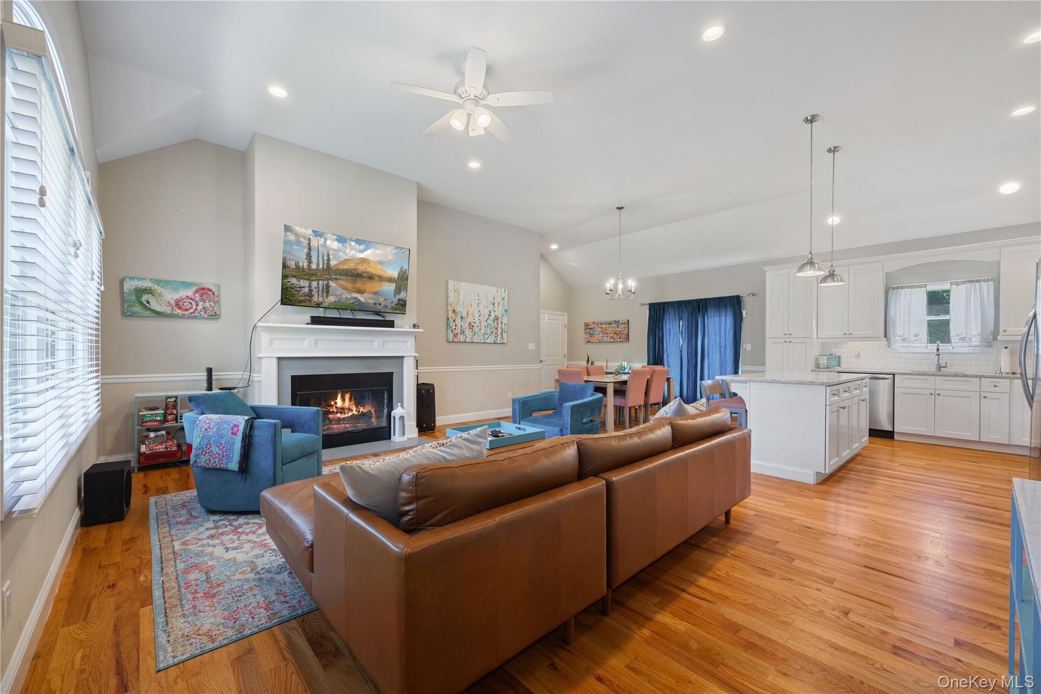 380 Homestead Way Greenport, NY 11944 - Photo 8 of 39 a living room with furniture and a fireplace