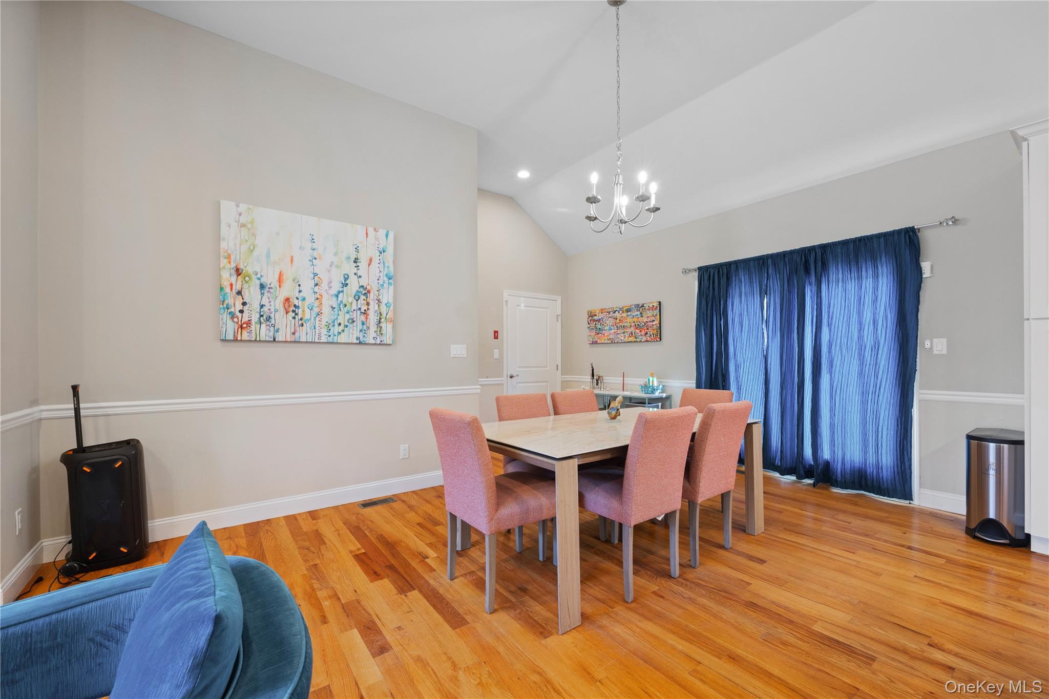380 Homestead Way Greenport, NY 11944 - Photo 9 of 39 a view of a dining room with furniture and wooden floor