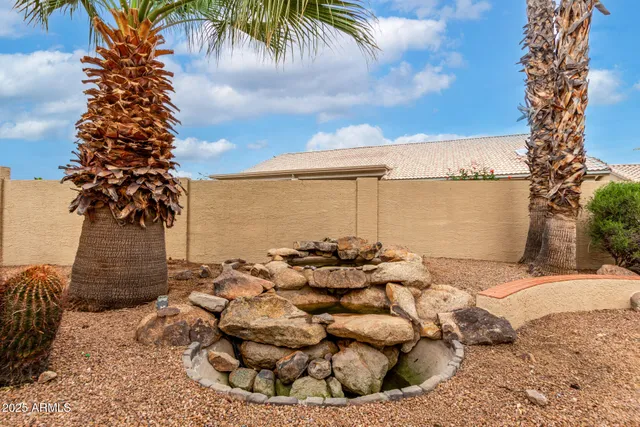 a view of a backyard of the house