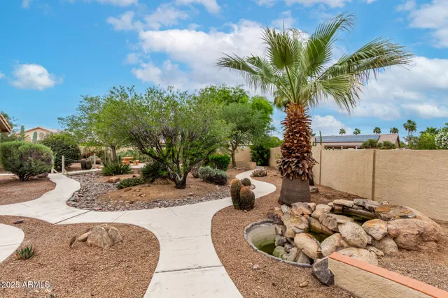 a view of a backyard of the house