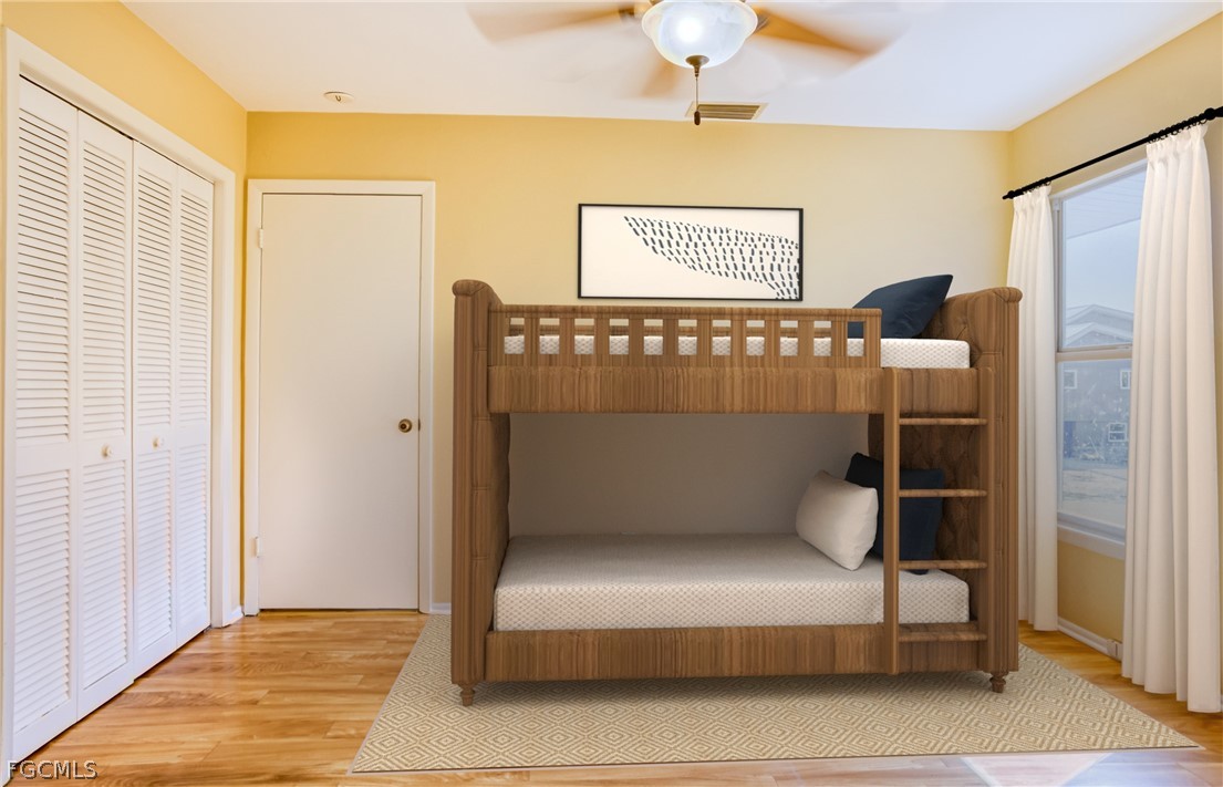 1813 Long Point Lane Sanibel, FL 33957 - Photo 15 of 38 a bed sitting in a room next to a window
