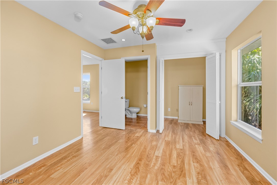 1813 Long Point Lane Sanibel, FL 33957 - Photo 20 of 38 a view of an empty room and window