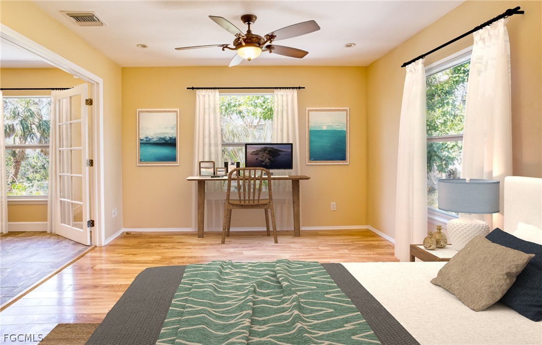 1813 Long Point Lane Sanibel, FL 33957 - Photo 24 of 38 a living room with furniture and a window