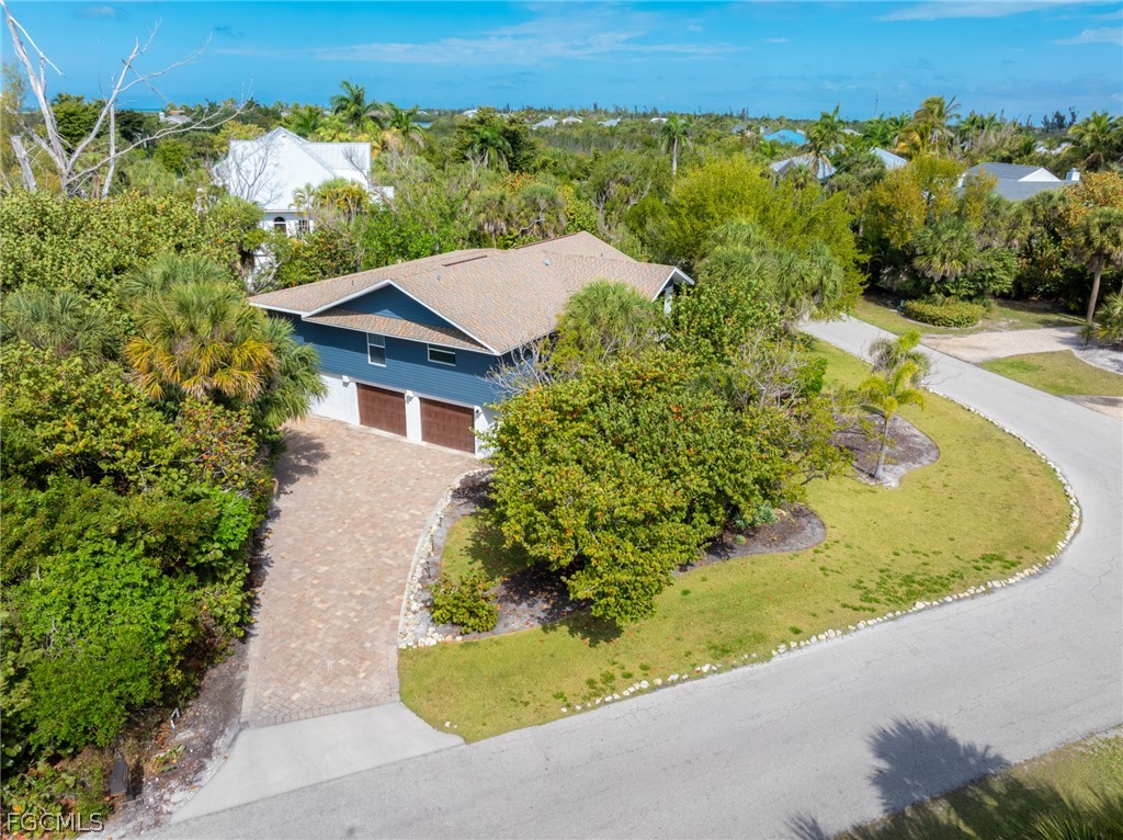 1813 Long Point Lane Sanibel, FL 33957 - Photo 32 of 38 an aerial view of a house