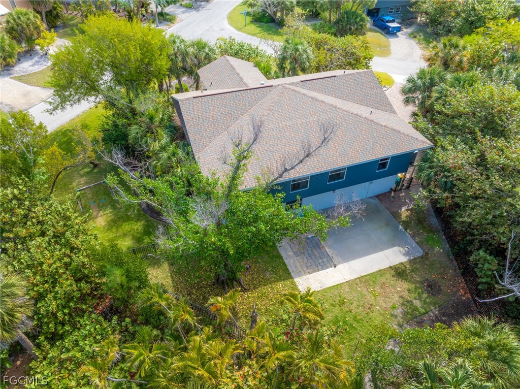1813 Long Point Lane Sanibel, FL 33957 - Photo 34 of 38 an aerial view of a house