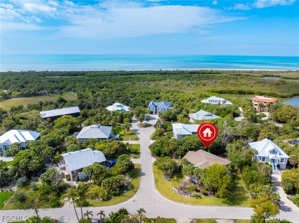 1813 Long Point Lane Sanibel, FL 33957 - Photo 37 of 38 an aerial view of residential houses with outdoor space