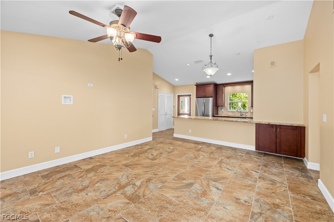 1813 Long Point Lane Sanibel, FL 33957 - Photo 8 of 38 a view of an empty room with a window