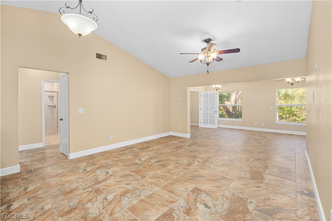 1813 Long Point Lane Sanibel, FL 33957 - Photo 9 of 38 a view of an empty room with a window