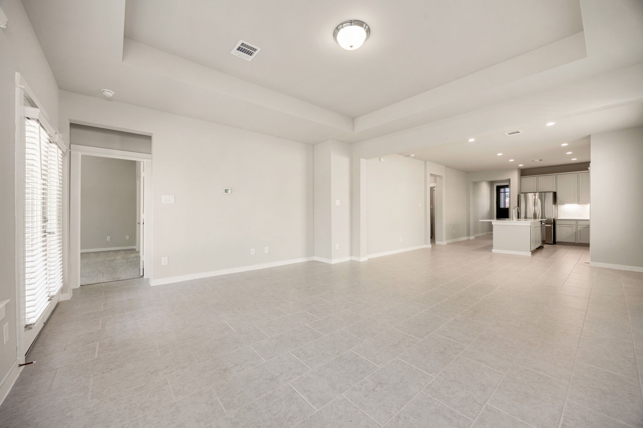 33007 Carolyns Perfection Loop Fulshear, TX 77441 - Photo 4 of 31 Family room with tray ceilings!