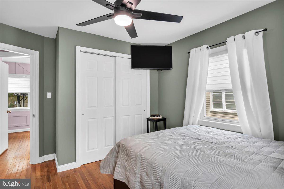 216 Evergreen Avenue Mantua, NJ 08051 - Photo 11 of 30 a bedroom with a bed and a flat screen tv