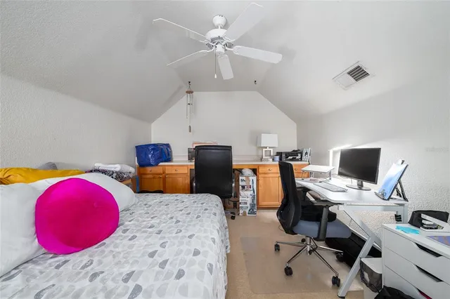 a view of a workspace with furniture