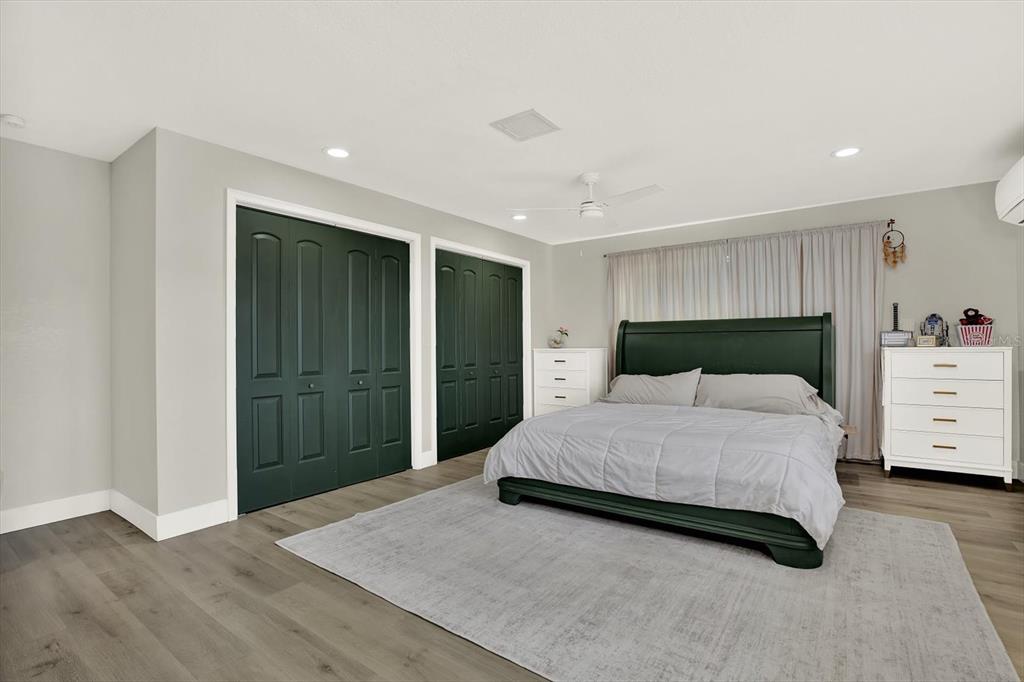 6060 39th Avenue North St. Petersburg, FL 33709 - Photo 13 of 29 a bedroom with a bed and a closet