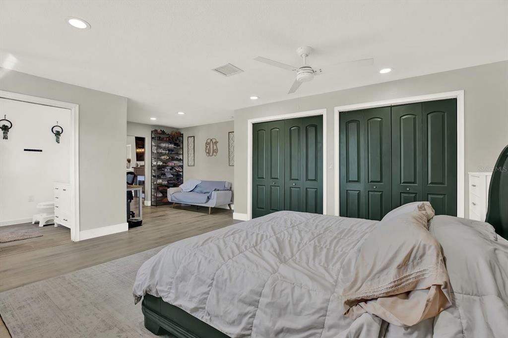 6060 39th Avenue North St. Petersburg, FL 33709 - Photo 14 of 29 a bedroom with a large bed and a large window