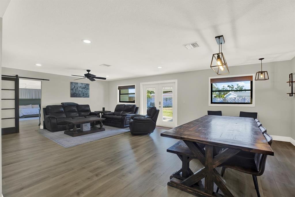 6060 39th Avenue North St. Petersburg, FL 33709 - Photo 21 of 29 a living room with furniture and wooden floor