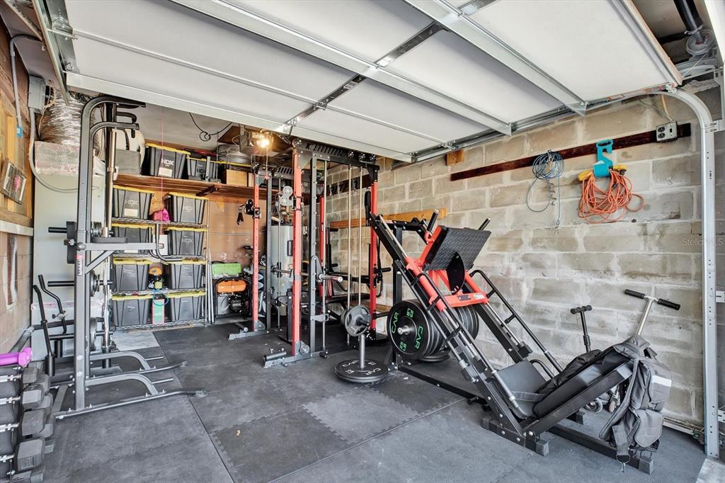 6060 39th Avenue North St. Petersburg, FL 33709 - Photo 27 of 29 a view of a storage room with clothes