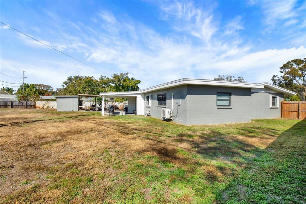 6060 39th Avenue North St. Petersburg, FL 33709 - Photo 28 of 29 a view of outdoor space yard and patio