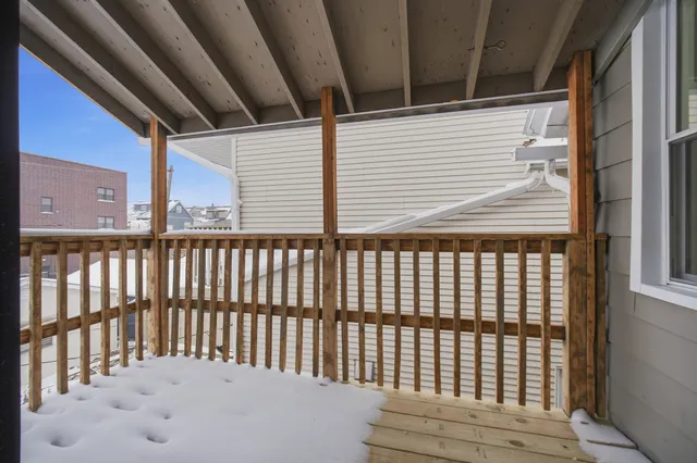 a bathroom with a double vanity sink a mirror and a shower