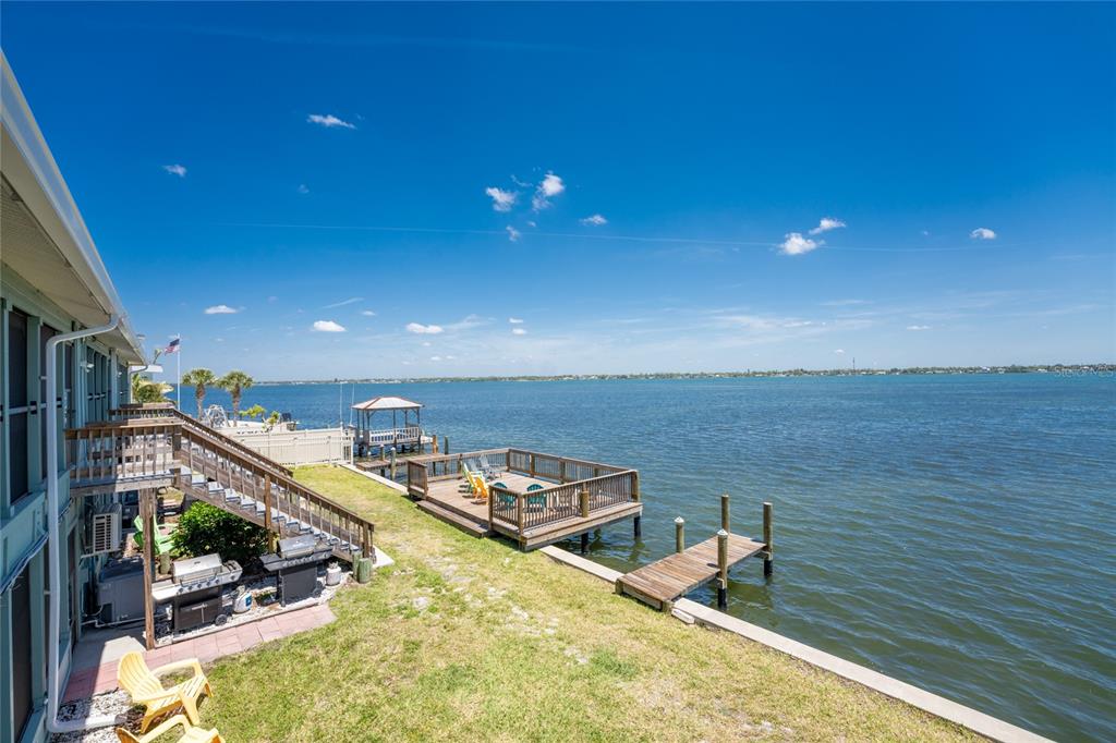 5041 North Beach Road, Unit 4A Englewood, FL 34223 - Photo 16 of 18 a view of a balcony with chairs