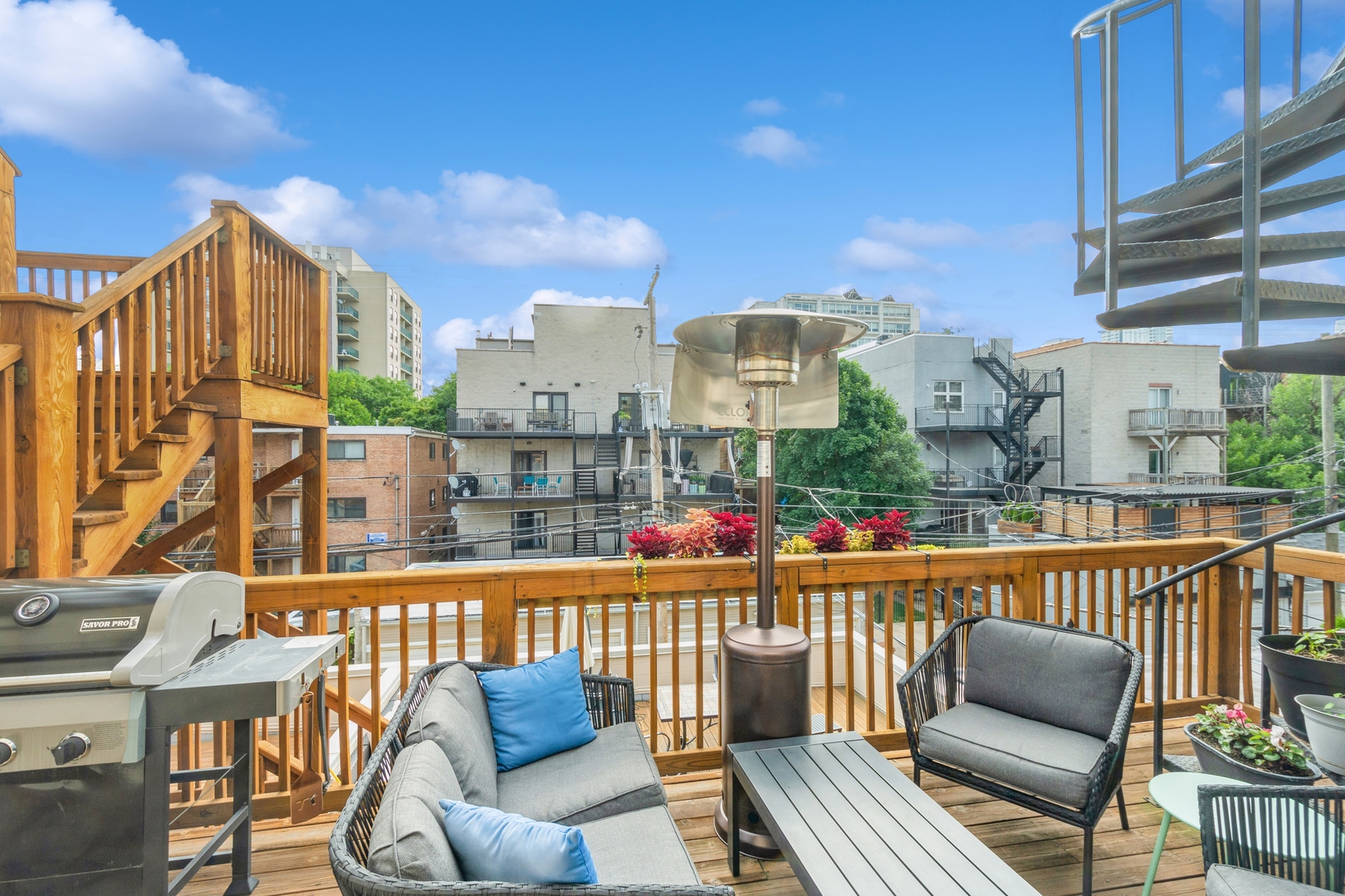 1355 North Mohawk Street, Unit 3S Chicago, IL 60610 - Photo 17 of 18 a view of a balcony with two chairs and a wooden floor