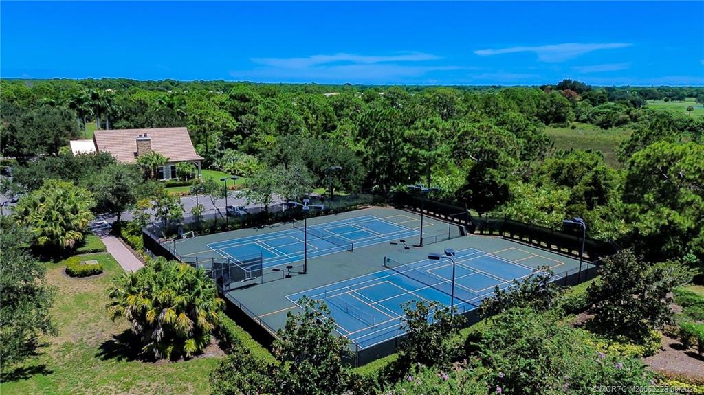 1092 Southwest Scrub Oak Avenue Palm City, FL 34990 - Photo 42 of 45 an aerial view of a house with outdoor space