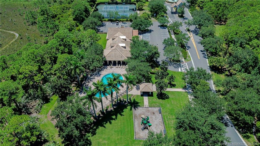 1092 Southwest Scrub Oak Avenue Palm City, FL 34990 - Photo 43 of 45 an aerial view of a house with a yard