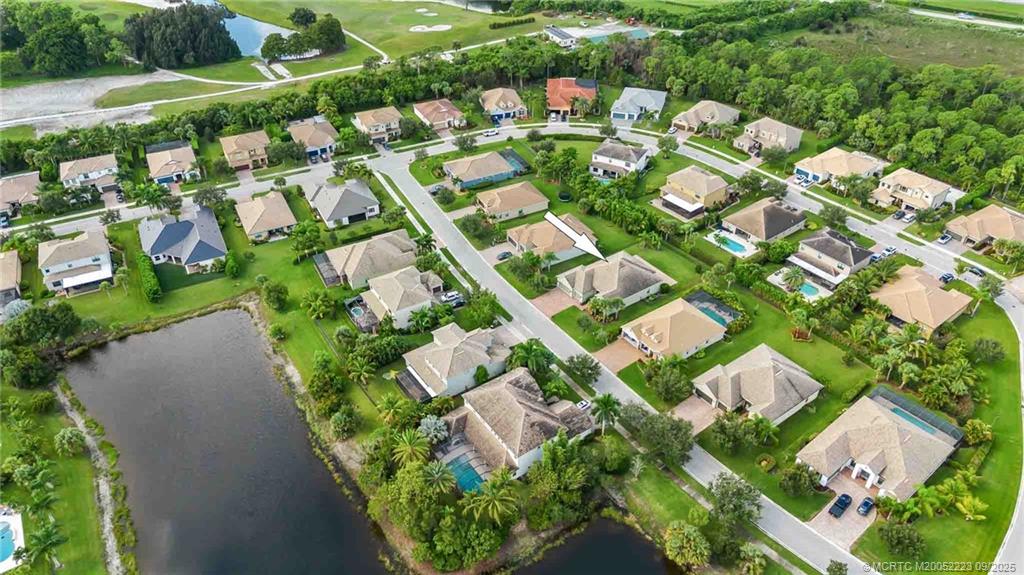 1092 Southwest Scrub Oak Avenue Palm City, FL 34990 - Photo 7 of 45 an aerial view of residential houses with outdoor space
