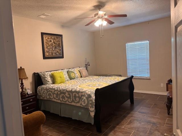 1002 Farm To Market 55 Barry, TX 75102 - Photo 10 of 21 a bedroom with a bed and a chandelier